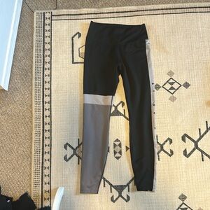 Black and grey Nike workout leggings.